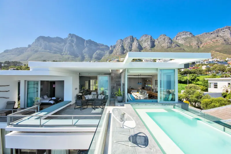Atlantic Reflection in Camps Bay – photo 1